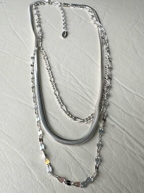 Ettika triple strand silver chains